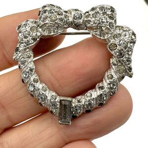 Silver tone rhinestone bow brooch